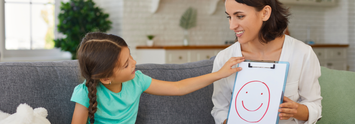A child practicing their speech in therapy